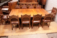 Exceptional renaissance style table 8 chair and 2 arm chairs in walnut