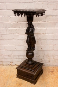 Figural breton pedestal in oak