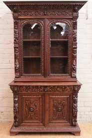 Figural renaissance style cabinet in oak