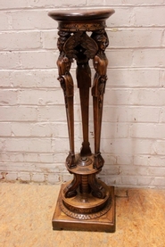 Figural renaissance style pedestal in walnut