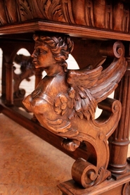 Figural renaissance style table in walnut