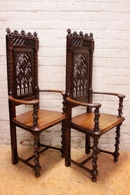 Gothic style arm chairs in chestnut