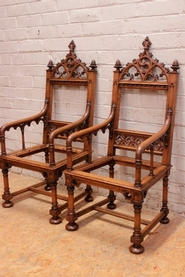 Gothic style arm chairs in oak needs to be re upholstered