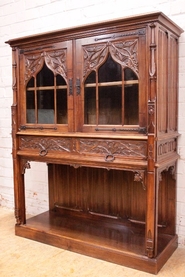 Gothic style display cabinet in walnut.