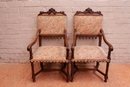 Gothic style 2 arm chairs and 10 chairs in Walnut, France 19th century