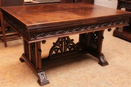 Gothic style table in oak with side leaves