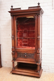 Henri II display cabinet in walnut and beveled glass