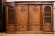 Large 4 door renaissance style bookcase in walnut