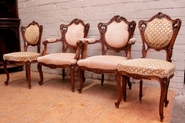 Louis XV arm chairs and chairs in walnut
