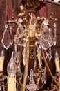 Louis XV style Chandelier in bronze and crystal, France 1900