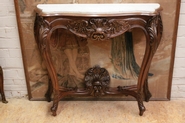 Louis XV console in walnut with marble top.
