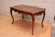 Louis XV desk table in walnut with gilt accents