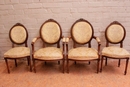 Louis XVI style Arm chairs and chairs in Walnut, France 1900