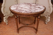 Louis XVI style gilt table with marble top