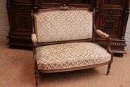 Louis XVI style sofa in walnut