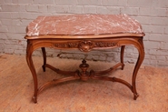 Marble top Louis XV style center table in walnut