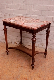 Marble top Louis XVI center table in walnut