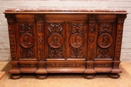 Marble top renaissance style sideboard in walnut signed by the maker