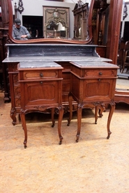 Matching pair Louis XV style end tables in walnut