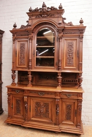 Monumental renaissance style cabinet in walnut