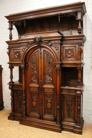 Monumental walnut Henri II castle cabinet