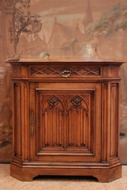 Narrow gothic cabinet in walnut with marble top