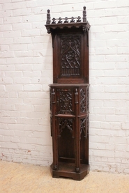 Narrow gothic style cabinet in oak