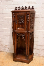 Narrow oak gothic cabinet
