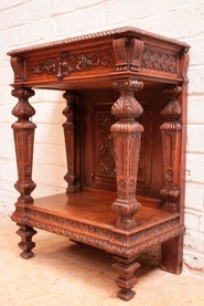 Narrow renaissance style console table in oak