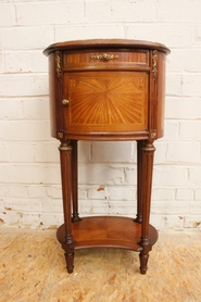 Oval Louis XVI nightstand with inlay and bronze