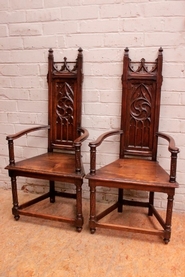 Pair gothic arm chairs in walnut