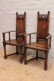 Pair gothic style arm chairs in walnut