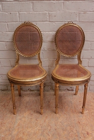 Pair Louis XVI gilt wood side chairs