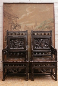 Pair oak breton arm chairs
