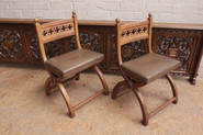 Pair oak gothic chairs with leather