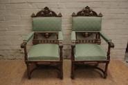 Pair quality renaissance arm chairs in walnut