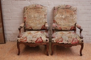 Pair regency style needlepoint arm chairs in walnut