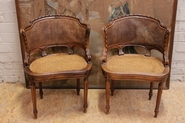 Pair walnut Louis XVI cained arm chairs