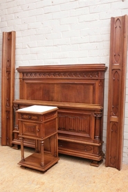 Quality gothic style bed and nighstand in walnut