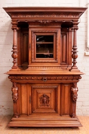 Quality renaissance figural display cabinet in walnut