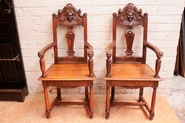 Quality renaissance style arm chairs in walnut