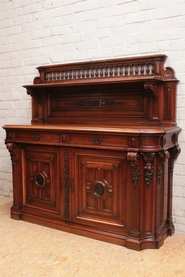 Quality renaissance style sideboard in walnut and bronze panels