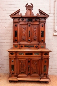 Renaissance cabinet in walnut with marble inlay signed by Gilbert Paris