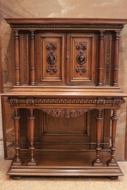 Renaissance credenza in walnut with gilt accents