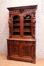 Renaissance figural bookcase in oak