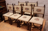 Renaissance style arm chairs and 4 chairs in walnut