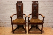 Renaissance style arm chairs in walnut