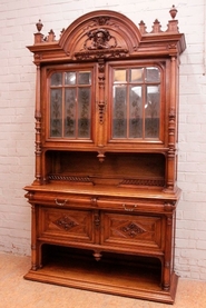 Renaissance style cabinet in walnut with special glass