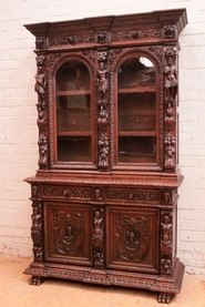 Renaissance style cabinet/bookcase with medieval statues in oak