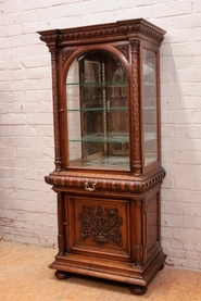 Renaissance style display cabinet with beveled glass